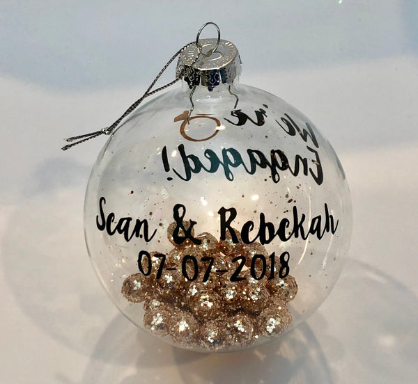 We're Engaged personalized glass ornament